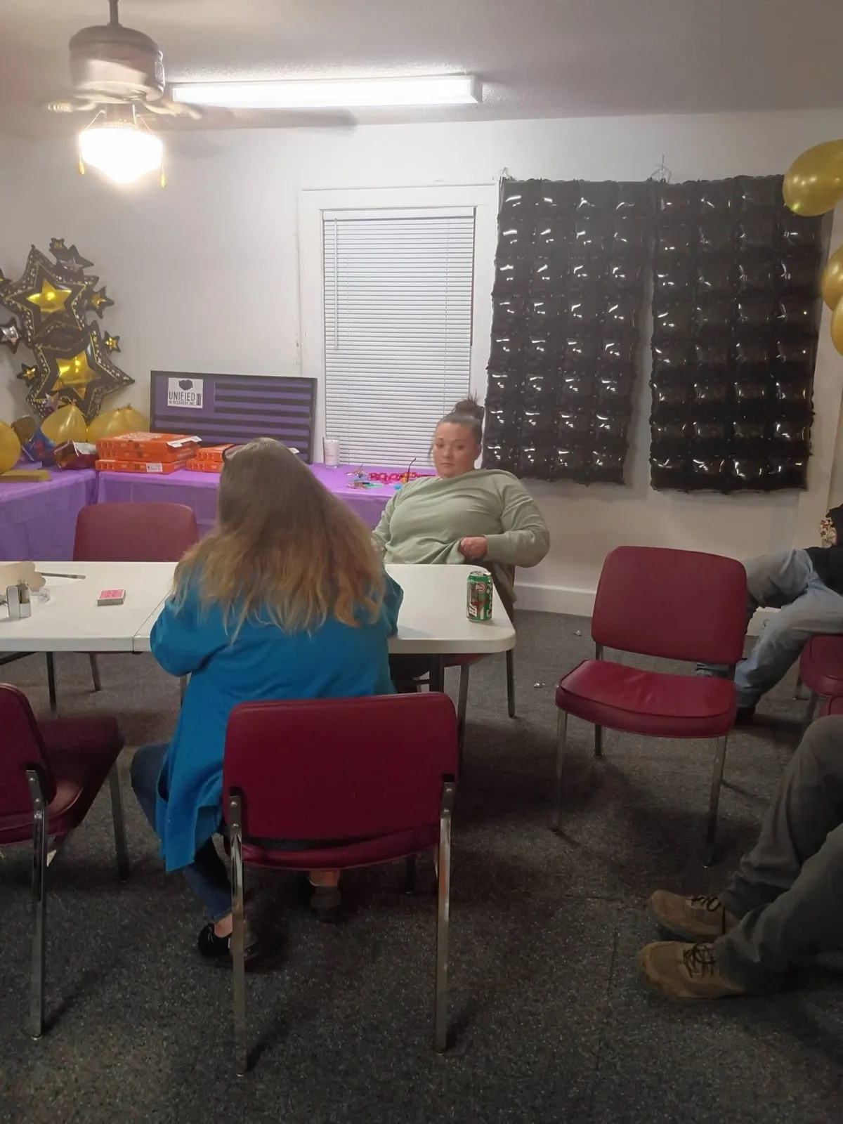 Unified in Recovery community members at a community event